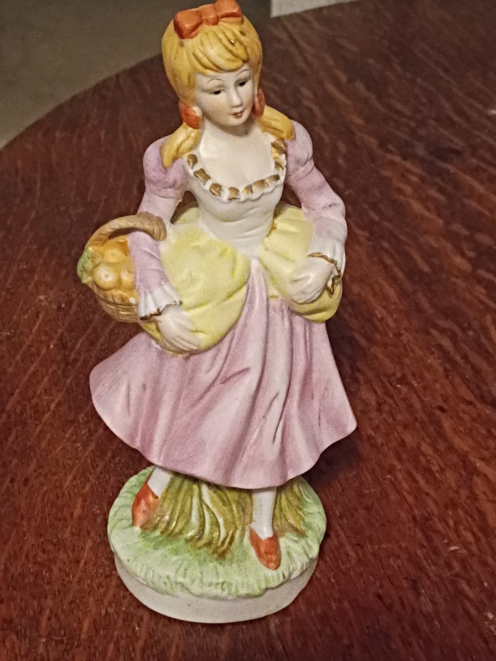 Porcelain Figurine of Girl in Pink Dress with Basket